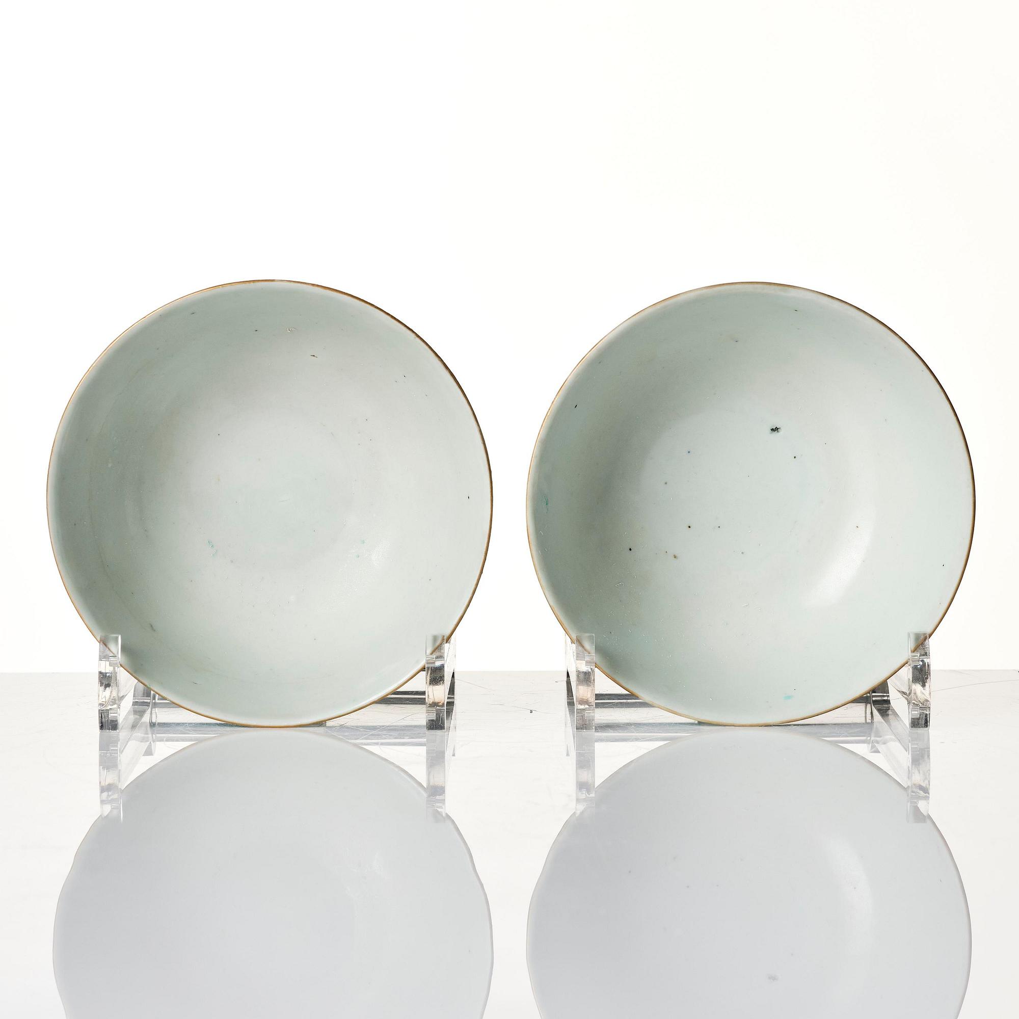 A pair of turquoise ground 'baijiaxiang' cups, Qing dynasty with seal mark in red.