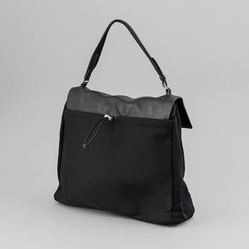 Prada, neoprene bag.