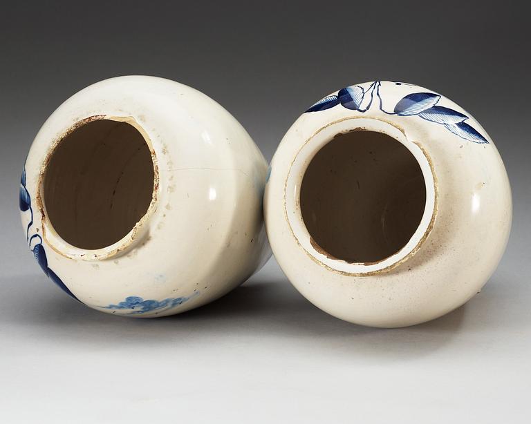 A pair of Dutch fainece tobacco jars, 18th Century.