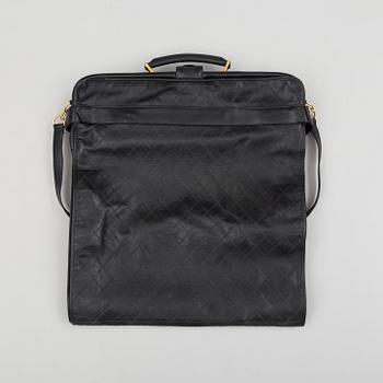 a CHANEL garment bag.