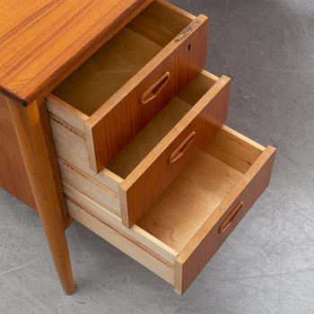 A 1950/60's oak and teak writing desk.