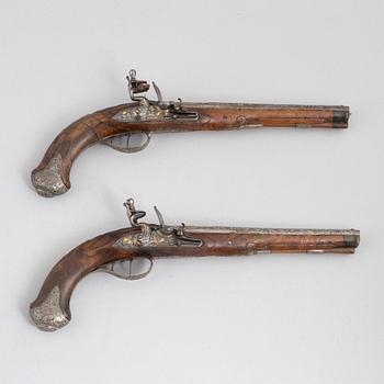 A Pair of flintlock pistols, by Johann Jacob Kuchenreuter, (Regensburg 1709-1783, Royal gunsmith).
