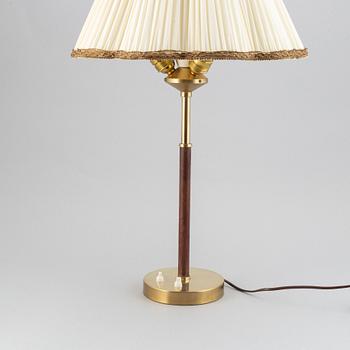 A brass and leather table lamp by Bertil Brisborg from Nordiska kompaniet, model no. 2043, 1940's/50's.