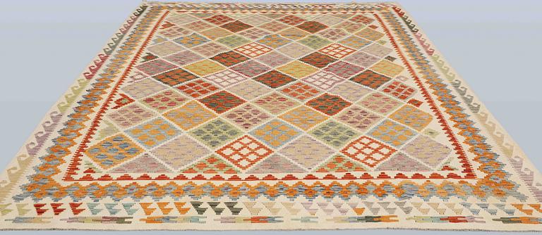 A Kelim carpet, 342 x 270 cm.