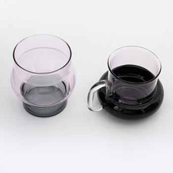 Tom Dixon, A 'Bump' glass teapot with for cups and a pair of glasses.