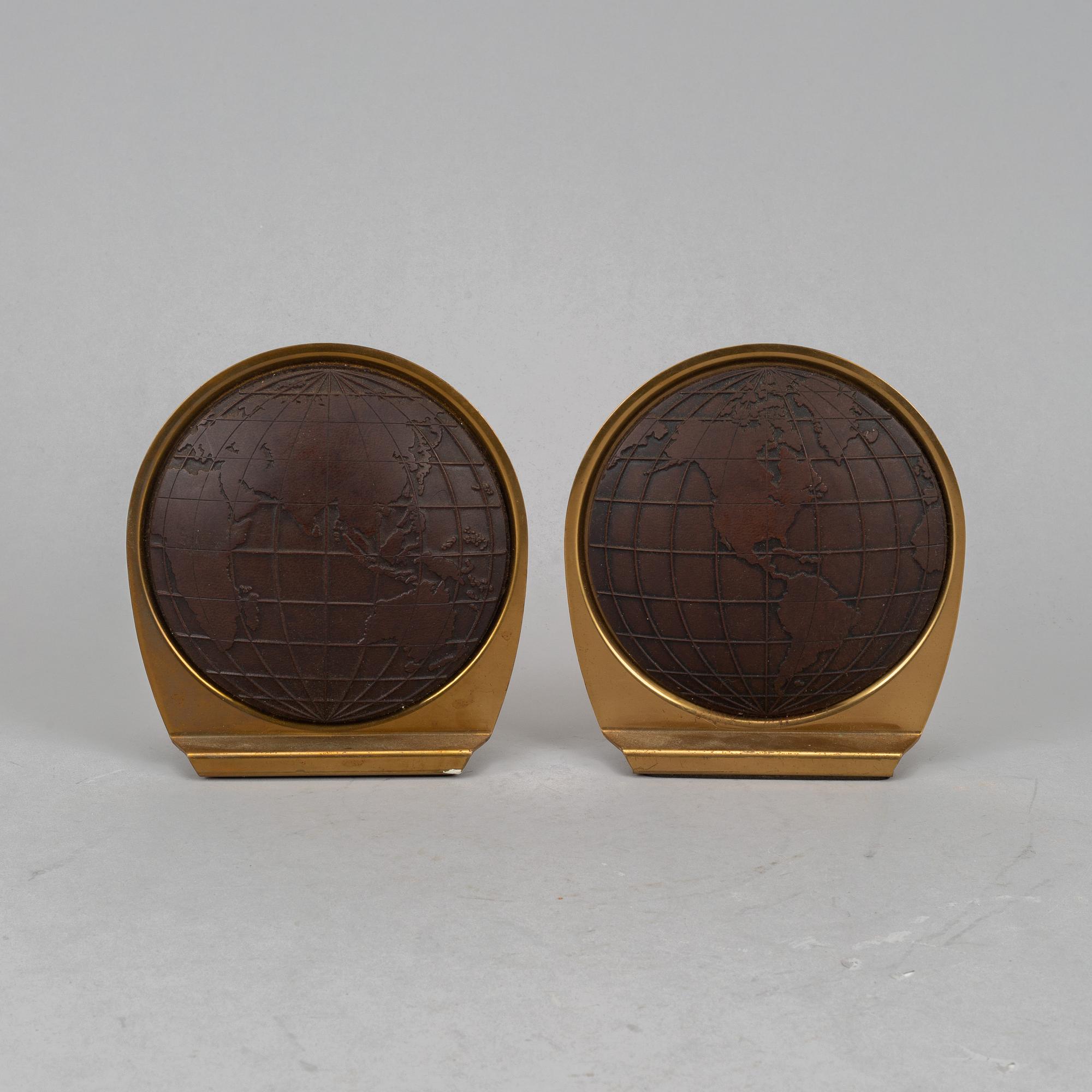A pair of brass book ends, mid 20th century.