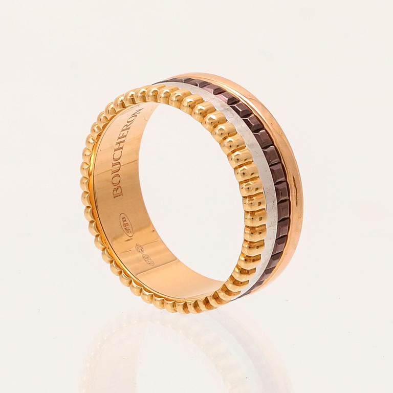 A “Quatre” ring in 18K yellow, pink, white gold and brown PVD by Boucheron.