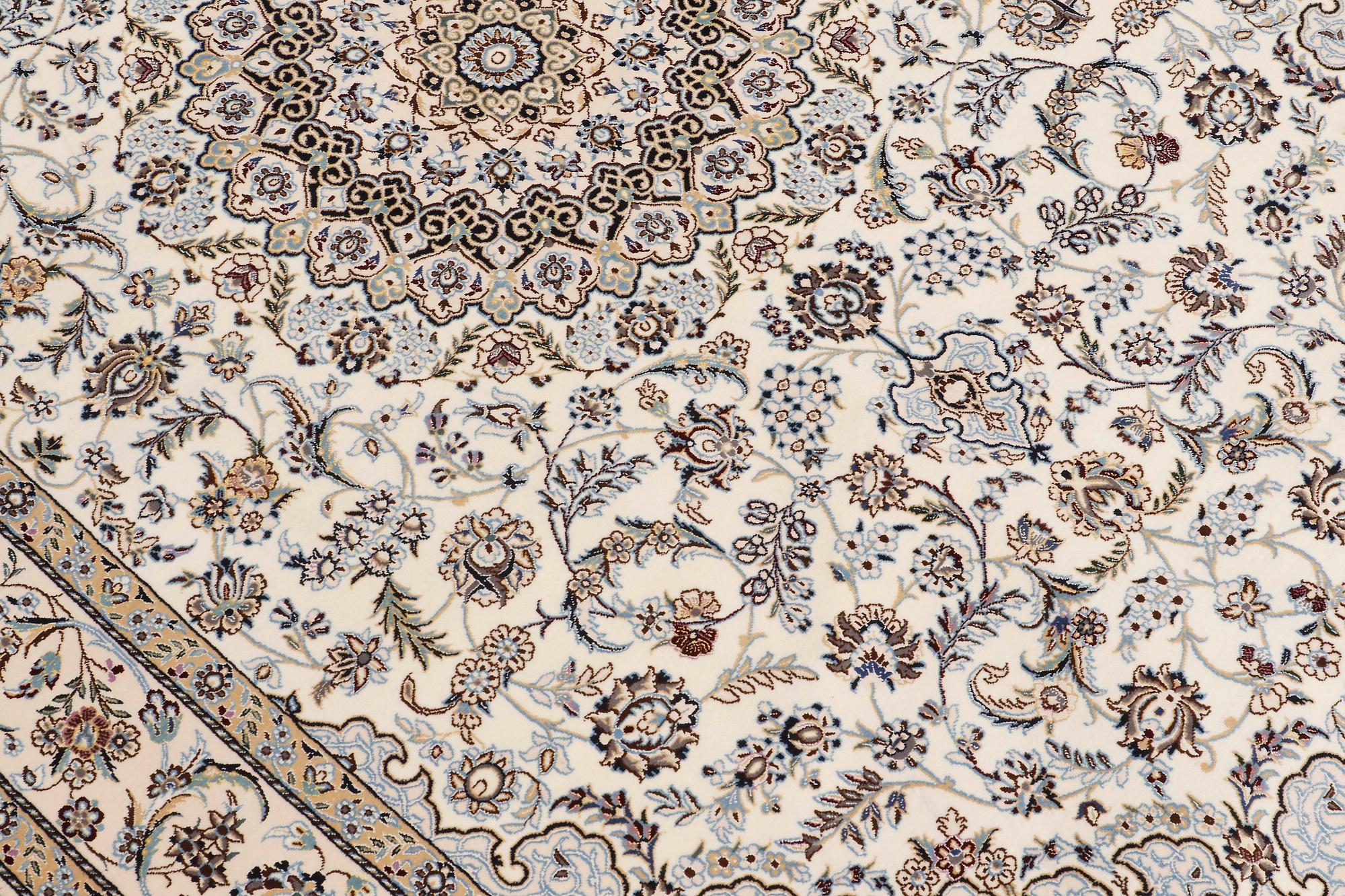 A carpet, Nain part silk so called 6 LAA, signed, ca 240 x 137 cm.