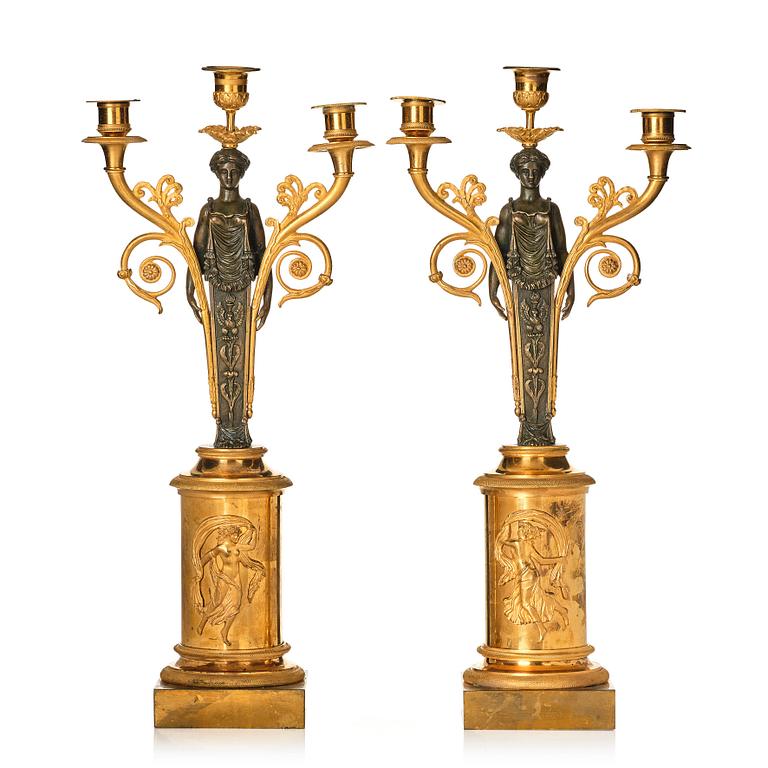 A pair of Swedish empire candelabra, attributed to R F Lindroth.