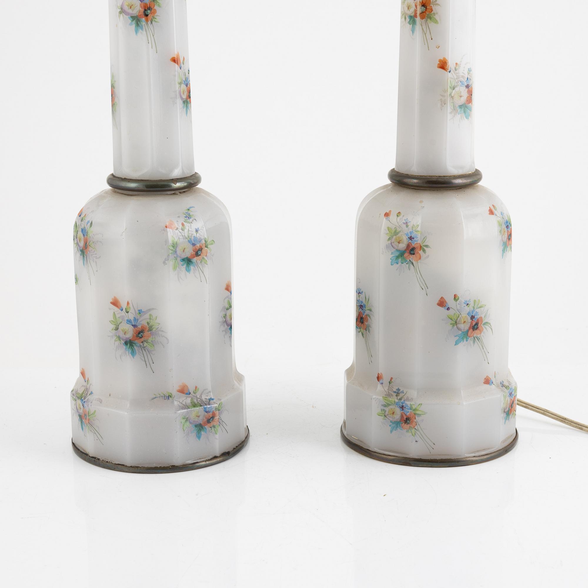 A pair of kerosene lamps, around 1900.