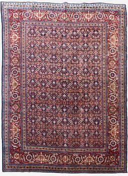 A carpet, a semi-antique Tabriz, ca 357 x 255 cm.