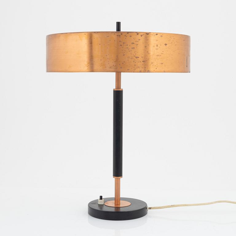 A copper table light, mid 20th Century.