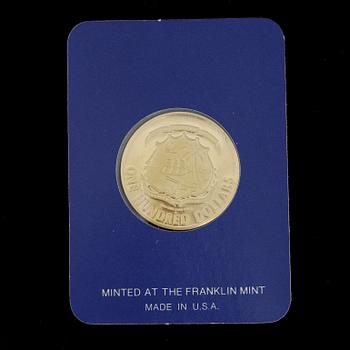 MINNESMYNT, 21,6 K guld, 100 dollar, Liberia, 1977. Vikt ca 10,9g.