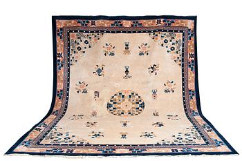 17. AN SEMI-ANTIQUE CHINESE CARPET.