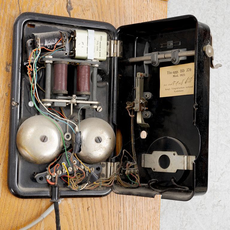 A wall mounted telphone, early 20th century.