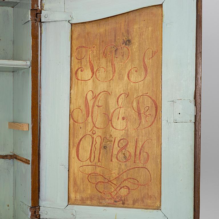 Skåp, allmoge, daterat 1816.