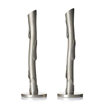 Nils Fougstedt, a pair of pewter vases model "A 949", Firma Svenskt Tenn, Stockholm, 1929. In the shape of a branch with four leaves on a round base,...