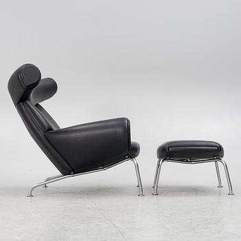 Hans J. Wegner, fåtölj med fotpall, "Ox Chair", EJ-100, Erik Jørgensen Møbelfabrik A/S, Svendborg, Danmark.