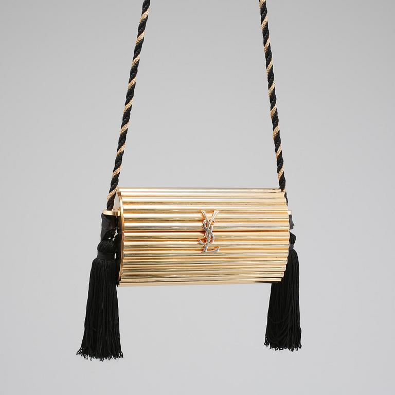 AFTONVÄSKA, "Gold Tassel Clutch", Yves Saint Laurent.