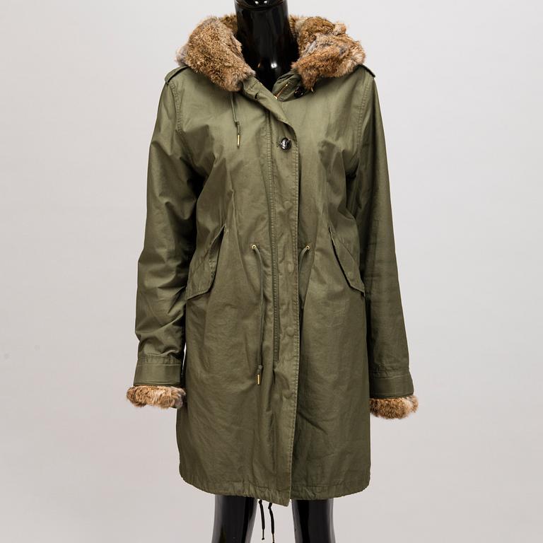 Ladies Woolrich Military Parka in size L.