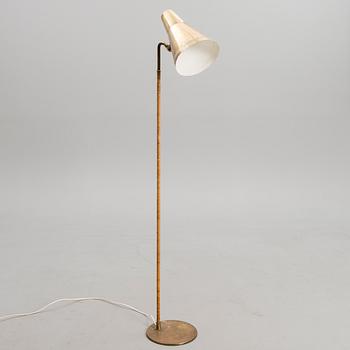 PAAVO TYNELL, A FLOOR LIGHT. Marked Idman.