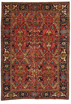 314. A CARPET, a semi-antique Heriz, ca 322-327 x 226,5 cm.