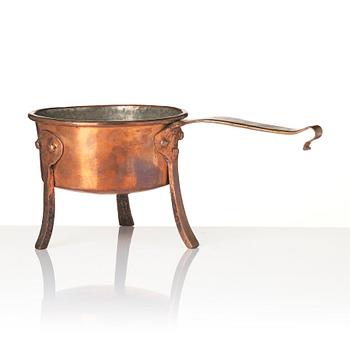 A copper saucepan, 18th century.