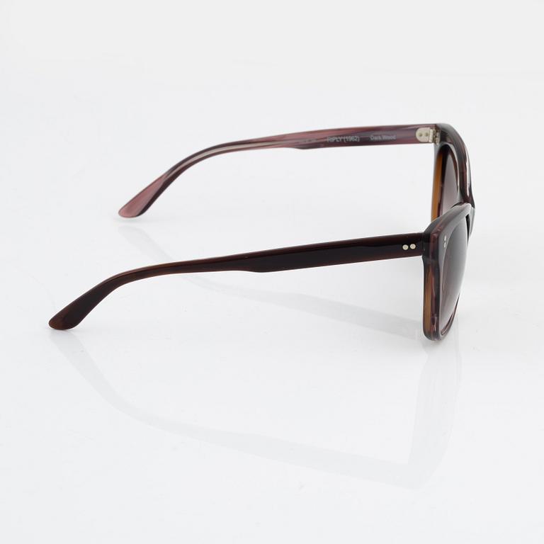 Oliver Goldsmith, a pair of sunglasses.