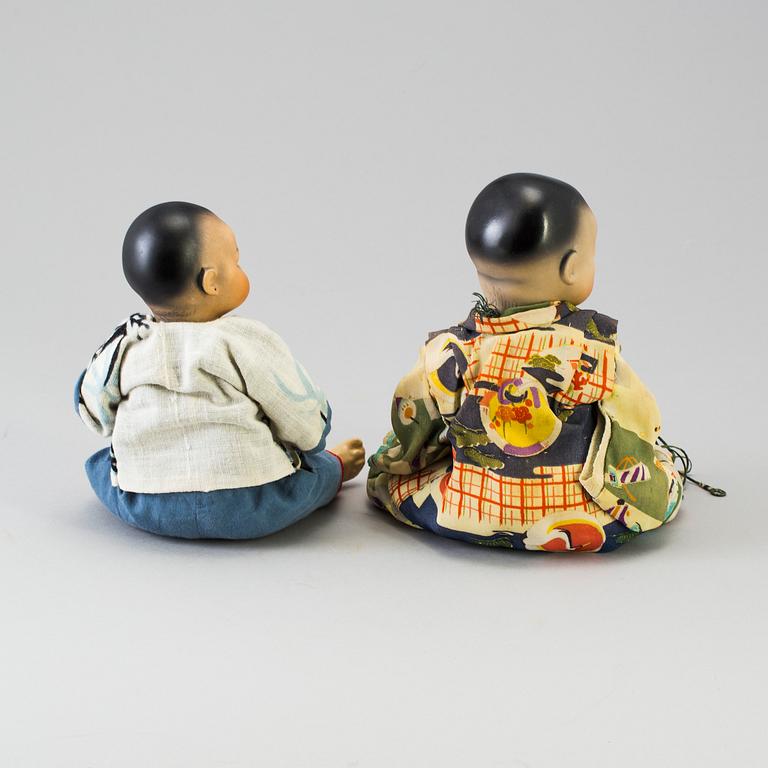 Two oriental bisque head baby dolls by Armand Marseille and Heubach Köppelsdorf, Germany, early 20th century.