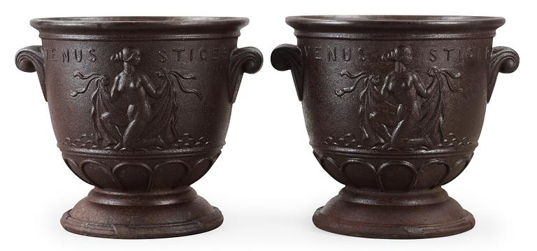 A pair of Ivar Johnsson cast iron jardinieres, Näfveqvarn, Sweden.