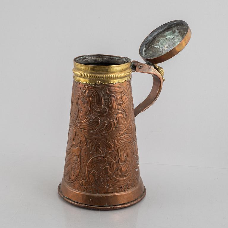 A presumably German Historismus repousse copper tankard, 19th century.