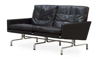69. A Poul Kjaerholm 'PK-31-2' black leather and steel sofa, E Kold Christensen, Denmark.
