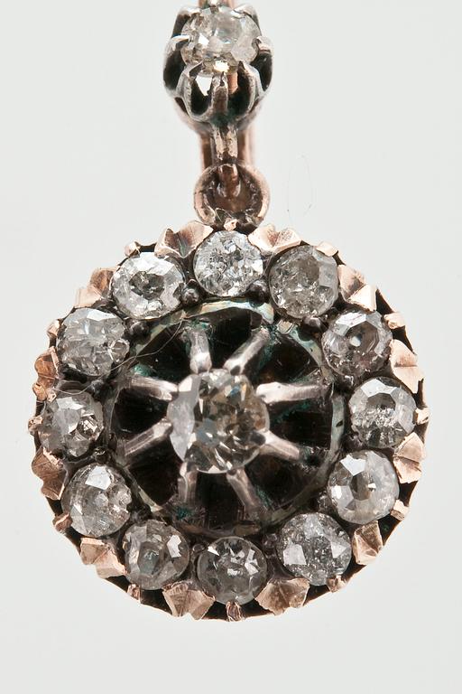 A PAIR OF DIAMOND EARRINGS.