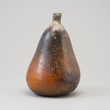 A Hans Hedberg fience sculpture of a pear, Biot, France.