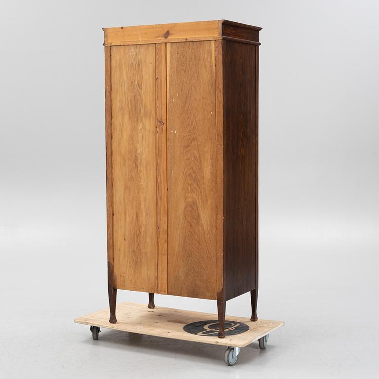 A cabinet, early 20th Century.