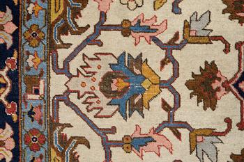 An antique Tabriz carpet, c. 365 x 280 cm.