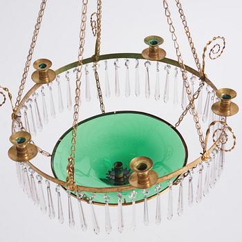 A late Gustavian gilt-brass and green glass six-light chandelier, late 18th century.