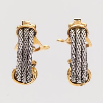 A pair of 'Force 10' earrings, 18K gold and steel. Fred, Paris 1980's.