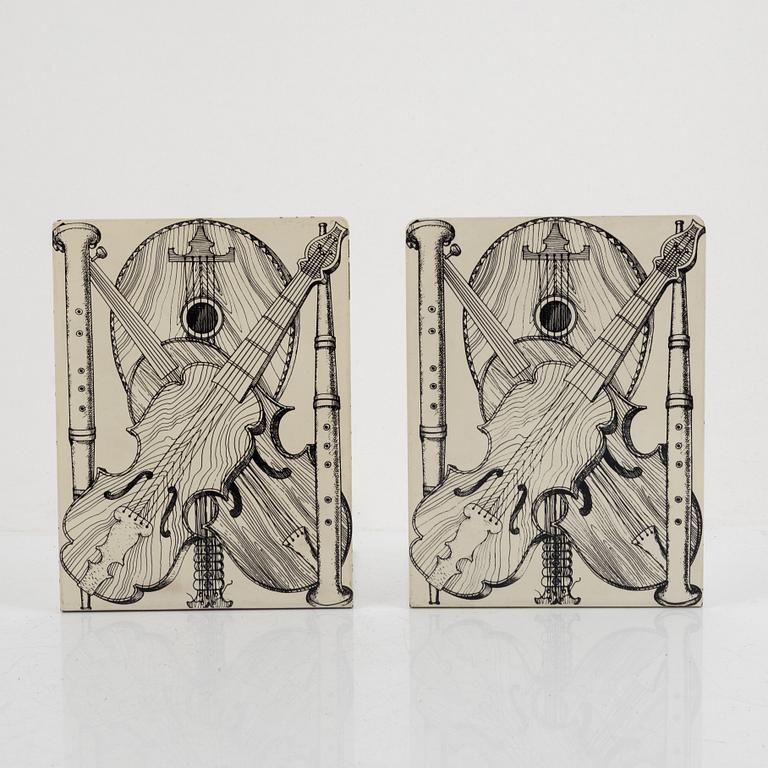 Piero Fornasetti, bookend "Strumenti Musicali", mid-20th century.