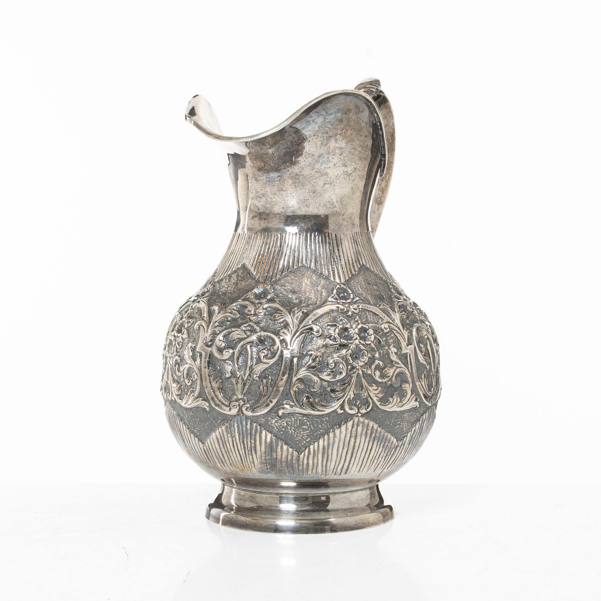 A silver jug, Middle East, mid 20th century.