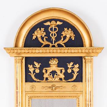 An Empire mirror, first half of the 19th Century.