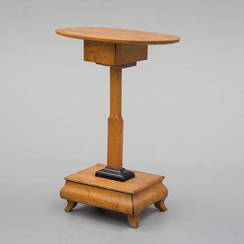 A 19th century sewing table.