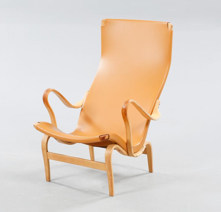 An armchair designed by Bruno Mathson, made by Firma Karl Mathsson 1965.