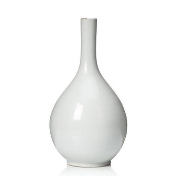 639. A white glazed anhua decorated vase, 18th Century, with Yongzheng four character mark.