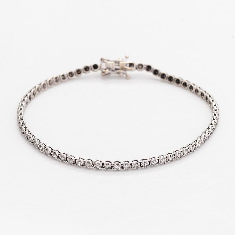Tennis bracelet, brilliant-cut diamonds totalling 2.70 ct, 18K white gold, Italy.