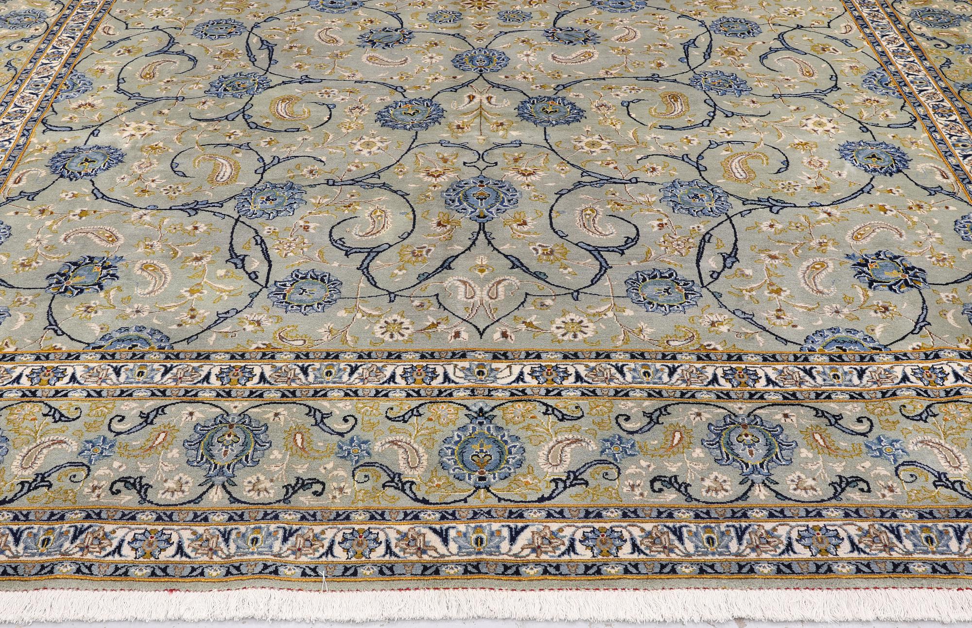 A Royal Keshan carpet, signed, 410 x 307 cm.