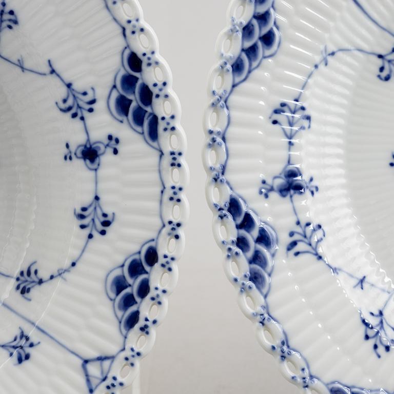 A 84-piece porcelain "Blue Fluted" service, mostly full lace, Royal Copenahgen, Denmark.