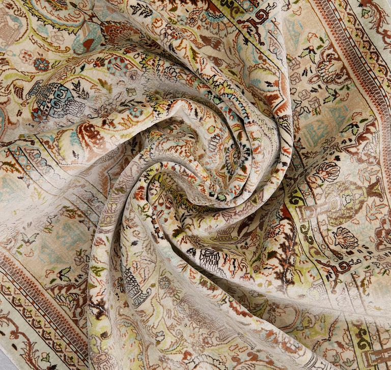 A pictorial oriental silk rug ca 158 x 90 cm.