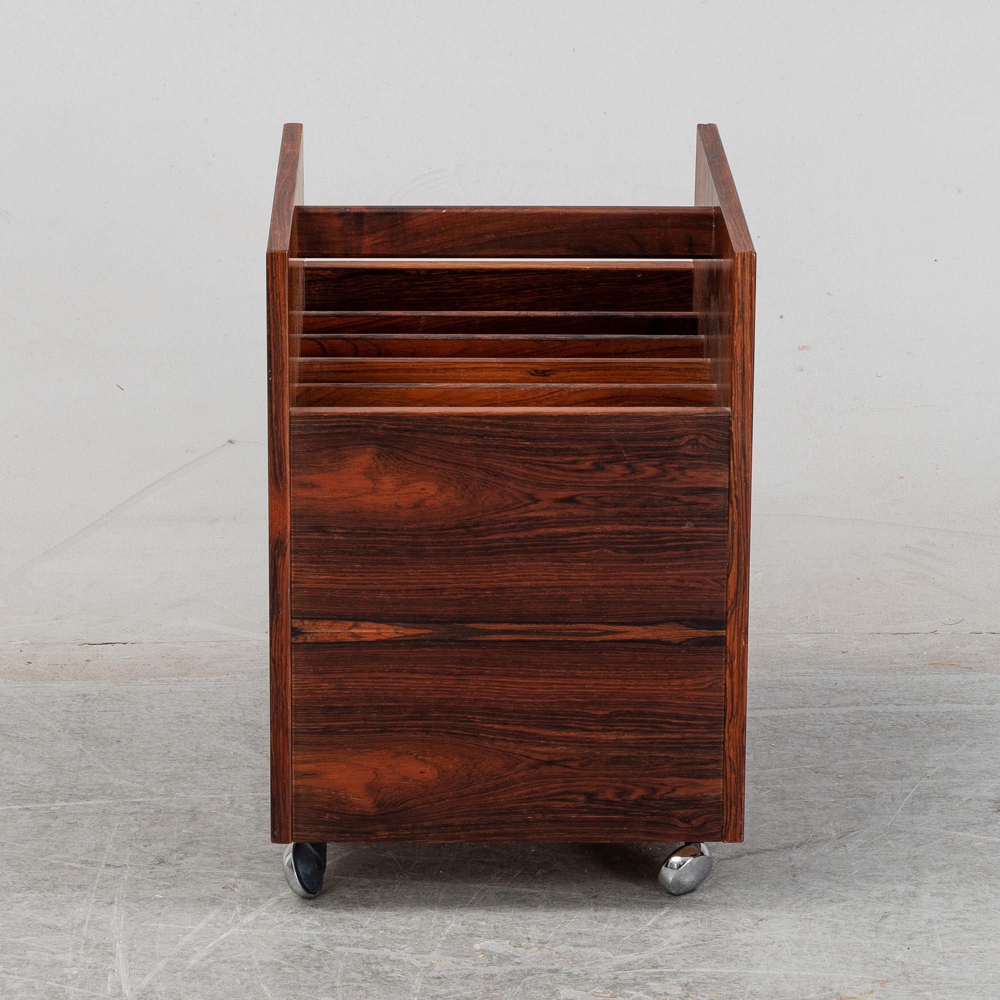 Rolf Hesland, a rosewood newspaper stand, Mellemstrands Trevareindustri, Bruksbo, Norway, 1960's/70's.