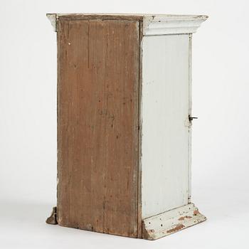 A Gustavian column-shaped cabinet, circa 1800.